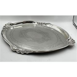 Edwardian silver oval tray with engraved decoration, shell handles within a raised border W46cm Sheffield 1901 Maker Walker & Hall 38oz
