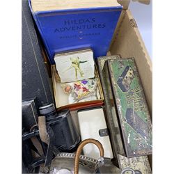 Early 20th century cribbage boards, domino sets, pair of 6x30 binoculars, pewter teapot, coins, cutlery sets, vintage compact, souvenir dolls etc in one box