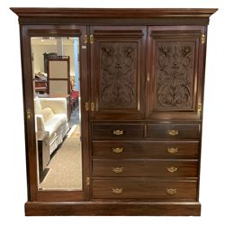 Edwardian walnut triple combination wardrobe, fitted with two carved and panelled doors, above two short and thee long graduating drawers, full height left hand mirrored doors with bevelled plate