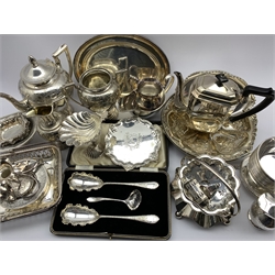 A cased early 20th century Dessert serving set comprising two foliate design spoons and sifter, all having chased decoration and other silver-plate including a tea set, shell moulded dish, Art Deco coffee pot, two trumpet table epergne, swing handled dish and other plate in one box