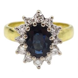 18ct gold oval sapphire and round brilliant cut diamond cluster ring, London 1974