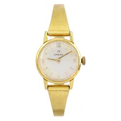 Omega ladies gold-plated manual wind wristwatch, on gold-plated bracelet