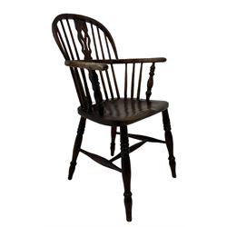 19th century low back Windsor chair, the splat and spindle back over elm seat, raised on turned supports united by a stretcher 