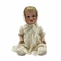 Heubach Koppelsdorf bisque head doll with composition moving ball and socket joints, sleeping brown eyes and blond hair, marked 300.4, L45cm 