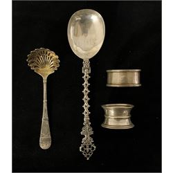 Ornamental silver spoon of 17th century design with pierced spiral stem Sheffield 1906 Maker Joseph Rodgers, Victorian silver sifting spoon with gilded bowl Sheffield 1875 Maker Martin Hall & Co and two silver serviette rings 4.1oz