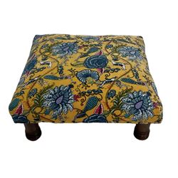 Small square footstool, upholstered in floral fabric
