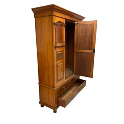 Edwardian walnut wardrobe, fitted with single mirror door over two short and on long drawer, raised on burn feet 