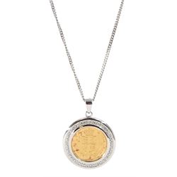 Queen Elizabeth II 2002 gold shield back half sovereign coin, mounted in white gold diamond mount, on white gold chain, both hallmarked 9ct
