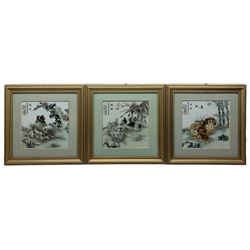 Chinese School (contemporary): Pekinese Dogs in Garden, set three porcelain panels, with original cases 23cm x 23cm (3)