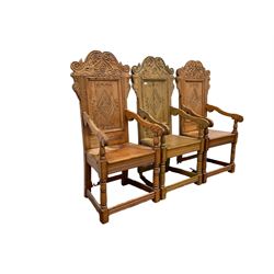Set six 17th century style oak Wainscot chairs, the shaped pediment relief carve with stylised plant motifs and scrolls, panelled back carved with lozenge, moulded plank seat, on turned supports joined by stretchers with incised decoration 