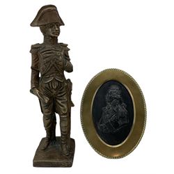  Oval basalt plaque of Nelson in a brass easel frame inscribed Marion, London 11cm x 8.5cm and a brass figure of Nelson H18cm (2)