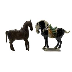 Tang Dynasty style glazed model of a horse, H21cm together with an Archaic style carved wooden horse with copper mounts (2)