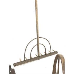 Vintage garden tools - wooden rake, 'Ransomes Cub' lawn mower and 'Horace Fuller' seed drill