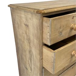 Victorian stripped pine chest, fitted with two short over three long drawers, raised on turned feet
