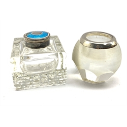 Edwardian square glass inkwell with silver and guilloche enamel lid, Birmingham, 1910 together with an early 20th century glass and silver mounted match striker (2)