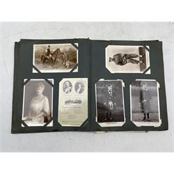 Edwardian postcard album containing approx 100 cards of English and European royalty from Edward VII and a few topographical cards  
