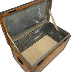 Early to mid-20th century wood and metal bound travelling trunk, the lid inscribed 'H.E. Sir Herbert Read. London (Yorkshire born art historian and poet)', zinc lined interior, fitted with metal carrying handles 