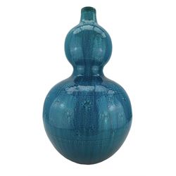  Burmantofts Faience turquoise-glaze vase, of double gourd form, the body incised with flowerheads and floral sprigs, within floral borders, impressed factory marks beneath, model no. 274, H53cm 