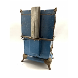American salesman's sample stove by Karr Range Company, nickel-plated steel-framed stove with blue enamelled finish, cast iron range top with six burners and five various sized pans, H56cm, W33cm, D22cm