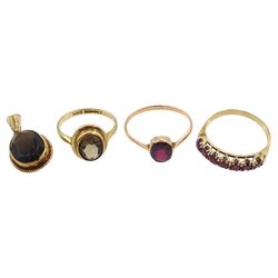 Gold smoky quartz ring and pendant and two gold garnet rings, all 9ct 