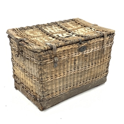 Large early 20th century wicker basket trunk, leather bound with cow hide, fitted with metal lock and hinges, leather straps and rope handles, W100cm, H66cm, D63cm