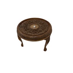 Early 20th century carved  Burmese hardwood occasional table, the top carved with flower heads and birds, on carved fulted supports terminating to clawed feet 