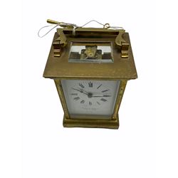 A French 20th century Anglaise cased 8-day timepiece carriage clock with a seven jewelled lever platform escapement with timing screws, white enamel dial inscribed “Mappin & Webb”, with Roman numerals and minute markers, steel spade hands, bevelled glass panels to the case and a rectangular glass panel to the top of the case.    With key.                  