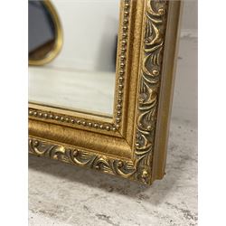 Pair of large gilt framed rectangular mirrors, the frame decorated with stylised foliate band and beaded inner slip, plain mirror plate 
Provenance: From the Estate of the late Dowager Lady St Oswald
