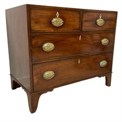 George III mahogany straight-front chest, fitted with two short over two long cock-beaded drawers, each with bone escutcheons and pressed brass handle plates with thistle motifs, on bracket feet