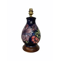 Moorcroft Anenome pattern baluster form table lamp on blue ground, H22.5cm excluding fitting