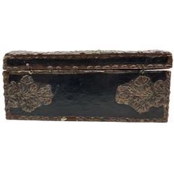 Continental, possibly Italian composition casket, polychrome decorated and applied with scrollwork borders and the slightly domed cover with central armorial motif displaying an endless knot motif, surmounted by a bird, L28cm 
