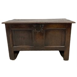 18th century oak coffer or chest, rectangular hinged lid with moulded edge, the front and sides panelled, raised on panelled stile end supports