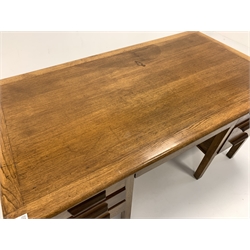 Mid 20th century oak twin pedestal desk, with one long drawer flanked by slides and five short drawers, raised on square supports, drawer locks stamped Burndale office furnishers, 152cm x 83cm, H77cm