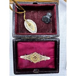 Various miscellaneous items including double sided pendant frame, gold brooch, bone dominos etc in metal deed box