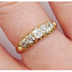 Gold graduating five stone old cut diamond ring, central diamond approx 0.20 carat
