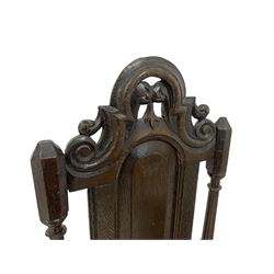 Pair 18th century oak hall chairs, high panelled backs with scroll carved and pierced pediment, fielded panel seats, turned front supports joined by plain stretchers and central matching scroll carved middle rail