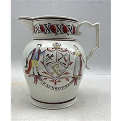 Early 19th century pearlware jug printed in puce with a portrait of Nelson and emblems, the reverse with a painted trade crest inscribed 'Love as Brethren' and a cartouche to the front 'JC 1807' H 18cm