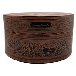 Burmese red lacquer circular box with internal tray, the cover with elephant and mahout D19cm, Indian rectangular box inlaid with mother of pearl W13cm and part of a carved wood Tibetan frieze carved with a peacock W15cm (3)