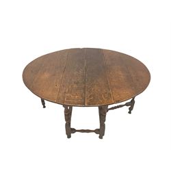 18th century oak drop leaf dining table, oval drop leaf top on turned supports joined by stretchers, gate-leg action base
