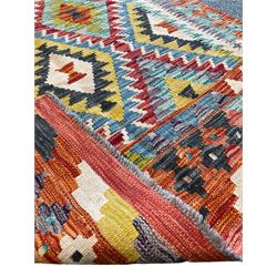 Chobi Kilim multi-ground rug, the field decorated with concentric lozenges with contrasting colours and ivory outlines, the guarded border with repeating geometric motifs