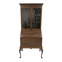 Early 20th century mahogany bureau bookcase, the bookcase top with glazed doors over bureau base, raised on cabriole supports
