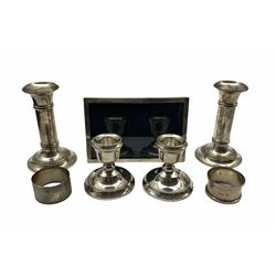 Pair of silver candlesticks with plain columns and circular foot H12cm Birmingham 1925 Maker Martin Hall & Co, pair of silver dressing table candlesticks, plain silver upright photograph frame and two serviette rings