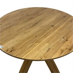 Circular oak centre/dining table, on sculptural base 