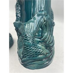 Pair of Ming style Chinese turquoise glazed vases, moulded in relief with fish leaping amongst crashing waves H26cm 