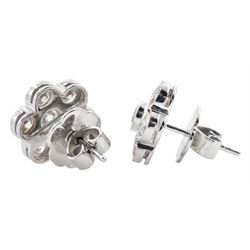 Pair of 18ct white gold round brilliant cut, daisy cluster stud earrings, total diamond weight 2.96 carat
