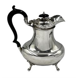 Silver baluster hot water jug with pierced rim, ebonised handle and lift on short shaped supports H19cm Birmingham 1915 Maker Alexander Clark & Co 12.7oz