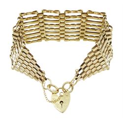 9ct gold eight bar gate bracelet with heart locket clasp, hallmarked