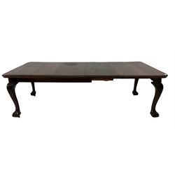 19th century mahogany extending dining table, the extendable top with two additional leaves with moulded edge over blank frieze, raised on carved cabriole supports with ball and claw feet, raised on castors  