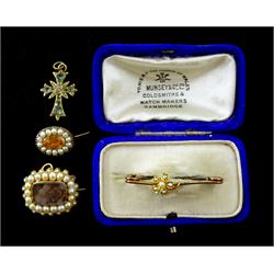 George III gold mounted split pearl mourning brooch the reverse dated 1817, smaller pearl and orange stone set brooch, gilt diamond and green stone set cross and gold pearl brooch (4)
