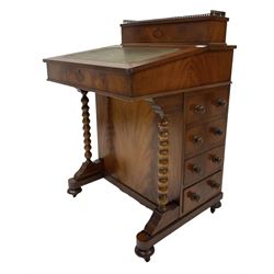 Reproduction mahogany davenport, raised back gallery cupboard with pigeon holes over writing slope and four drawers and four faux drawer, raised on castors 